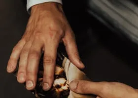 pexels-photo-10472996-10472996 A close-up shot of two hands exchanging a photograph, concept of memory and relationships.